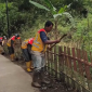 Pemkab Bogor Rapikan Jalan Raya Galuga, Bahu Jalan Dibersihkan Demi Kenyamanan Pengguna.