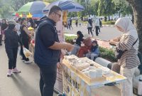 Kolaborasi Warga dan Pedagang, CFD Tegar Beriman Semakin Tertib dan Bersih. 