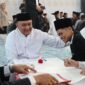 Nikah Massal di Masjid Baitul Faizin, Wujud Kolaborasi Pemkab Bogor dan Kemenag Layani Masyarakat.